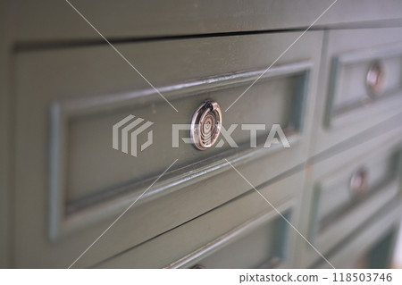 Grey chest of drawers in bedroom interior. Classic furniture. Grey chest of drawers in bedroom interior. Classic furniture. 118503746