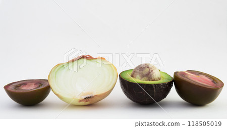 Vegetables black tomatoes, avocado and onions on white background 118505019
