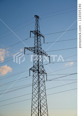 Power lines with wires on blue sky with clouds 118505140