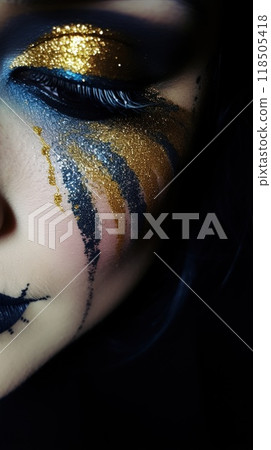 Beautiful woman eye close-up with blue and gold glitter make-up 118505418