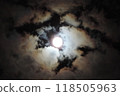 moon peeking out from the clouds 118505963