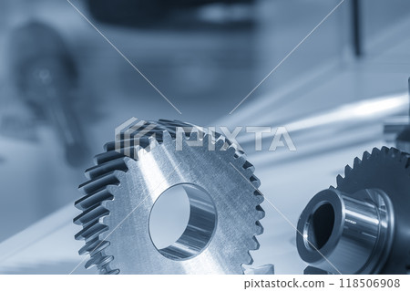 Close up the transmission gear spare parts in the light blue scene. Close up the transmission gear spare parts in the light blue scene. 118506908