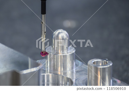 Closeup scene the CMM machine measuring the aluminum automotive parts. 118506910