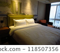 A beautiful hotel bed while traveling abroad 118507356