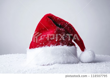 Christmas Santa Claus hat on white background. Generative AI. Christmas Santa Claus hat on white background. Generative AI. 118507795