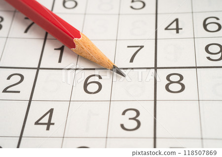 Sudoku puzzle game playing to challenge brain. Sudoku puzzle game playing to challenge brain. 118507869