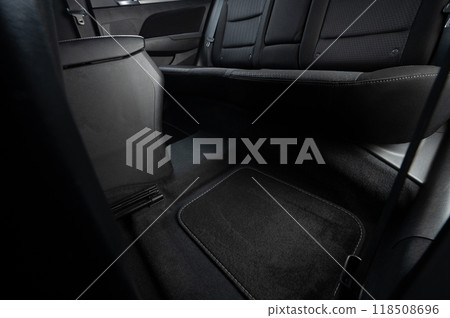 Clean car floor with black cloth mats Clean car floor with black cloth mats 118508696