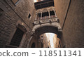 A historical Gothic bridge between buildings in Barri Gotic Quarter, Barcelona, Spain. 118511341