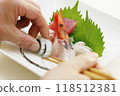 Serving sashimi 118512381