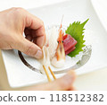 Serving sashimi 118512382