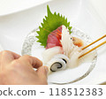 Serving sashimi 118512383