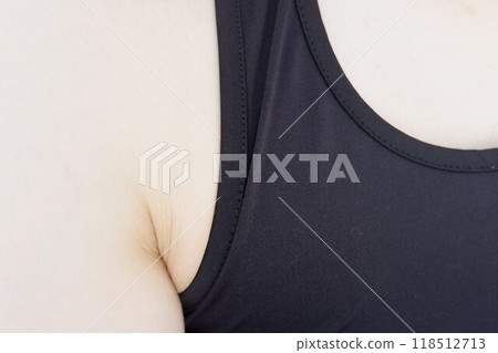 Armpits when wearing a black tank top 118512713