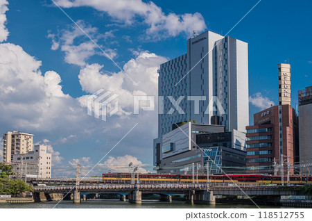 Keihan train crossing the Neyagawa iron bridge, Osaka City 118512755