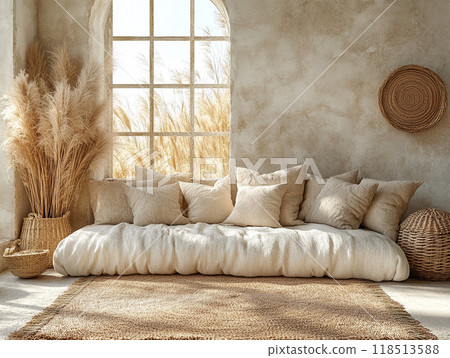 A boho living space Soft natural light and warm tones create a cozy, calming vibe. A boho living space Soft natural light and warm tones create a cozy, calming vibe. 118513588
