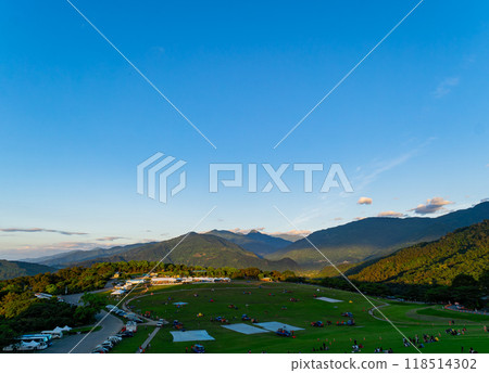 Sunrise landscape with people preparing for the hot air balloon festival at the Luye Highlands Sunrise landscape with people preparing for the hot air balloon festival at the Luye Highlands 118514302
