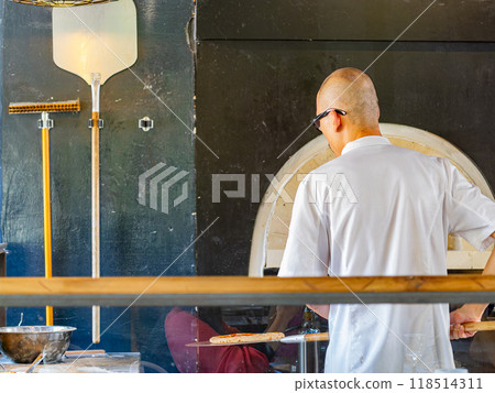 Close-up shot of a chef preparing Italian-style dough 118514311