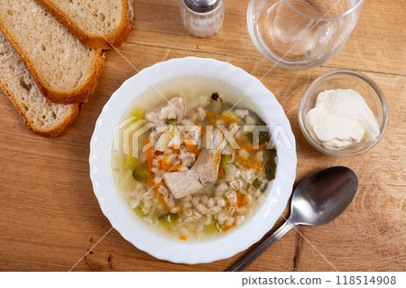 Rassolnik with sour pickles and pearl barley 118514908