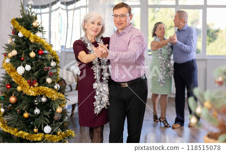 Adult man and elderly woman dancing tango Adult man and elderly woman dancing tango 118515078