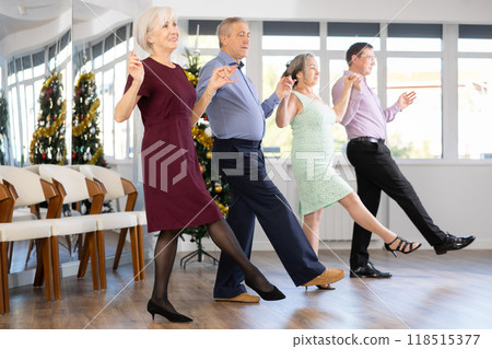 Group of men and women dancing folk dance 118515377