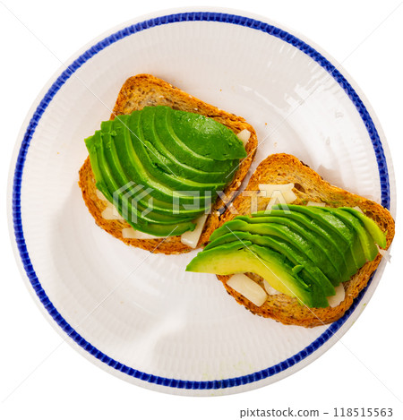 Toast with sliced avocado and cheese 118515563