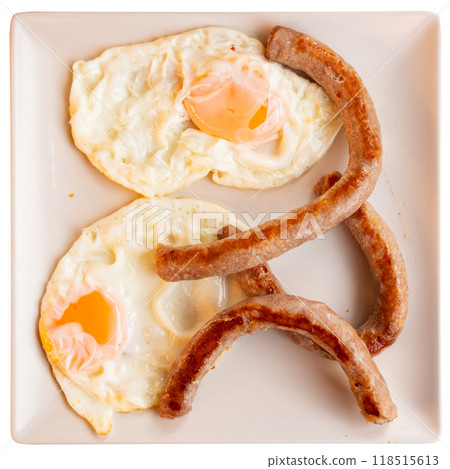 Breakfast with sunny side up eggs and grilled butifarra sausages 118515613