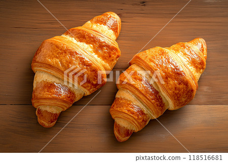 Flat lay set of croissants fresh French baked bread on wood background. Food Bakery Cafe concept. 118516681