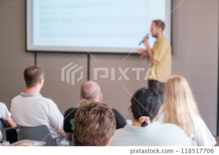 Business presentation with audience and presenter using microphone 118517706