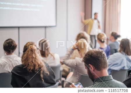 Business presentation with engaged audience in conference room 118517708