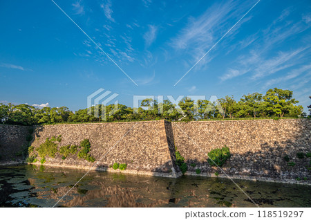 Osaka Castle stone wall in the setting sun Osaka Castle stone wall in the setting sun 118519297