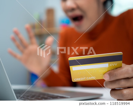 Online banking transaction concept, Woman is dismissal with credit card, Using smartphone shopping online, E Commerce and secure mobile banking concept, Making online payments. Online banking transaction concept, Woman is dismissal with credit card, Using smartphone shopping online, E Commerce and secure mobile banking concept, Making online payments. 118519994