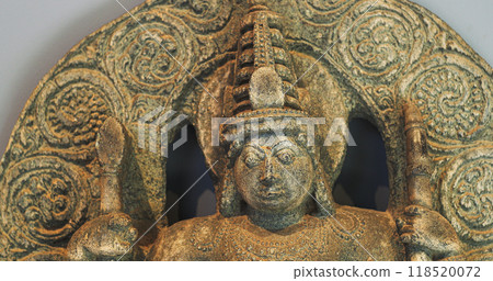 Close-up View on Ancient Statue Of Bhairava Or Frightful, Or Kala Bhairava, Is Shaivite And Vajrayana Deity Worshipped By Hindus And Buddhists. Antique Museum Piece Of Hoyasala Period, Karnataka 12th 118520072