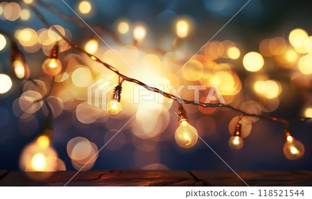 Glowing garland with light bulbs, defocused bokeh background. Festive illuminating decoration Glowing garland with light bulbs, defocused bokeh background. Festive illuminating decoration 118521544