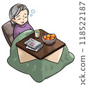 Senior woman dozing off in a kotatsu 118522187