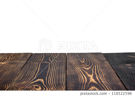 A wooden table is isolated over a white background. The table is made of wood and has a natural, rustic look 118522596