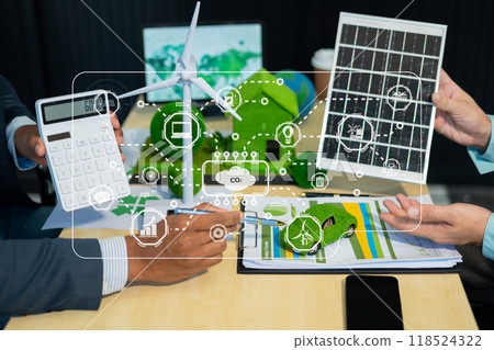 Holding a light bulb against nature on green leaf with energy source icon for renewable and sustainable development, ecology concept. 118524322