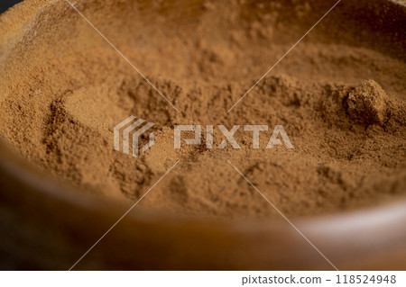 cinnamon tree bark with golden powder cinnamon tree bark with golden powder 118524948