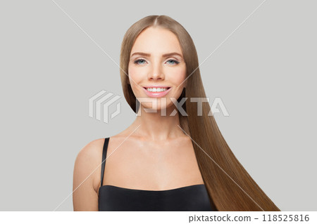 Nice woman with long healthy straight shiny hairstyle, make-up and fresh skin posing Nice woman with long healthy straight shiny hairstyle, make-up and fresh skin posing 118525816