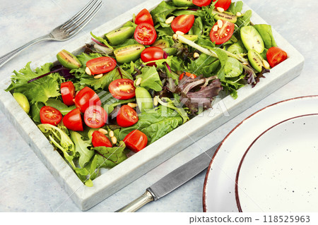 Tomato and lettuce salad. Tomato and lettuce salad. 118525963