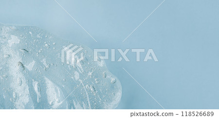 Transparent Skin care Product on Blue Background Transparent Skin care Product on Blue Background 118526689