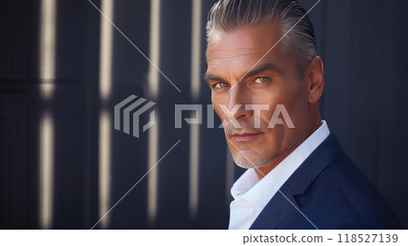 Suave Mature Male in Traditional Business Attire 118527139