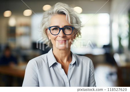 Mature SEO Consultant, Smiling Female Professional in Office Mature SEO Consultant, Smiling Female Professional in Office 118527620