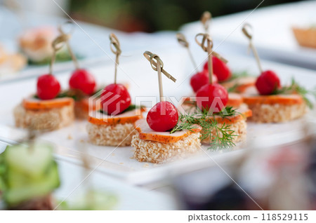 Catering buffet table with snacks and appetizers Catering buffet table with snacks and appetizers 118529115