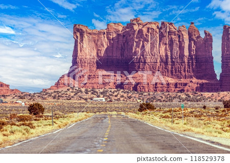Panoramic picture along an empty road through Monument Valley Panoramic picture along an empty road through Monument Valley 118529378