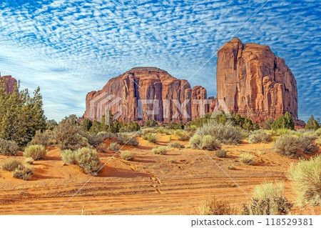 Panoramic picture of the glowing red geological sandstone formations in Monument Valley Panoramic picture of the glowing red geological sandstone formations in Monument Valley 118529381