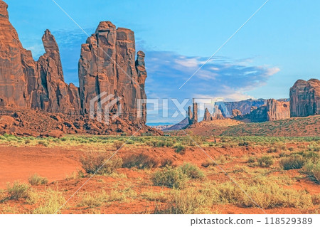 Panoramic picture of the glowing red geological sandstone formations in Monument Valley Panoramic picture of the glowing red geological sandstone formations in Monument Valley 118529389