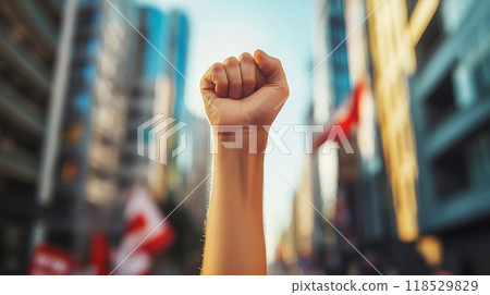 Raised fist in protest 118529829