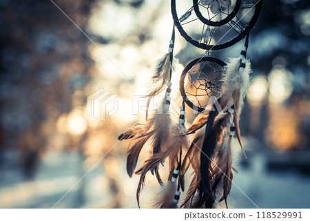 Dreamcatcher amulet outdoor, boho. American native amulet on sunset Dreamcatcher amulet outdoor, boho. American native amulet on sunset 118529991