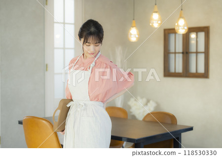 Tired apron woman 118530330