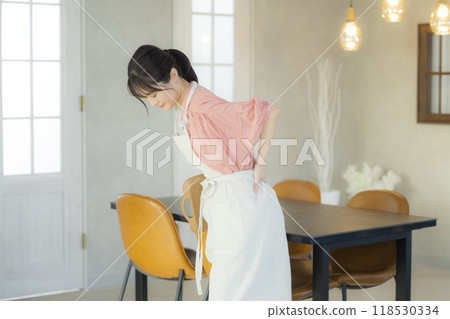 Tired apron woman 118530334
