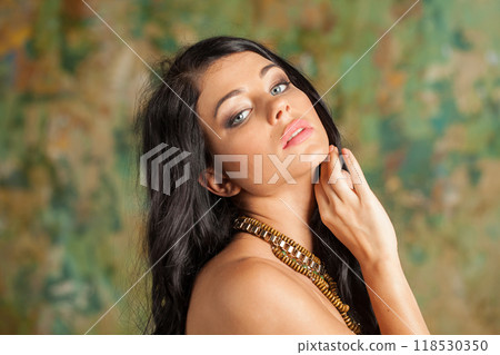 Lovely fashion model woman with healthy long hairstyle and trendy make-up.  118530350